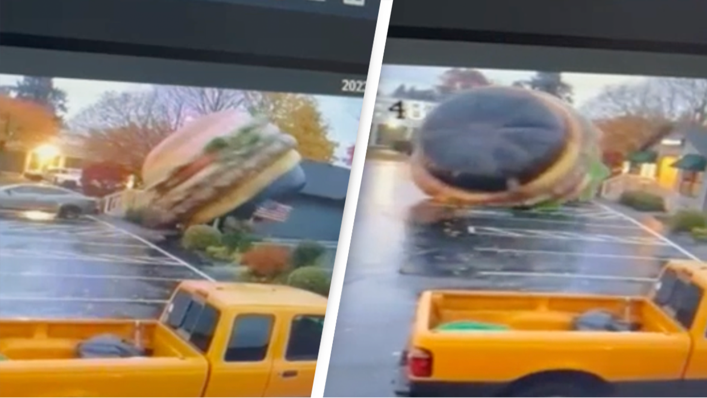 Shocking moment giant inflatable hamburger rolls through parking lot causing havoc